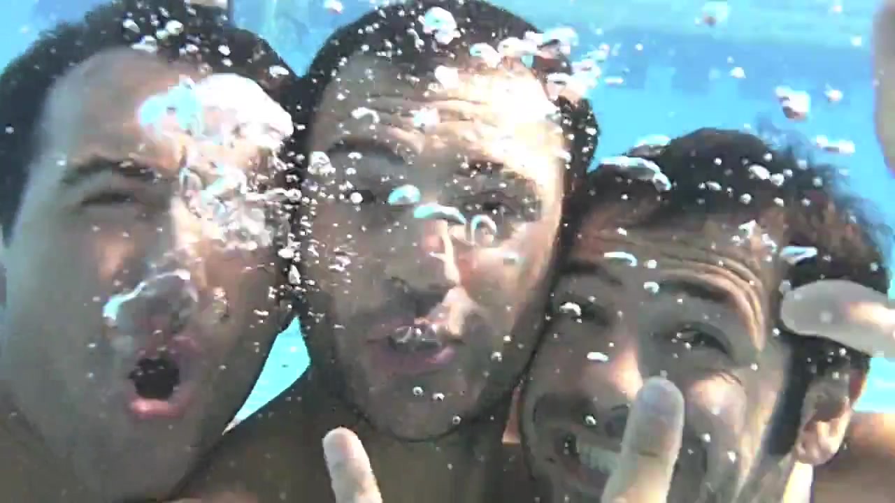 Three barefaced cuties goofing underwater