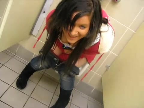 Girl peeing in urinal - video 2