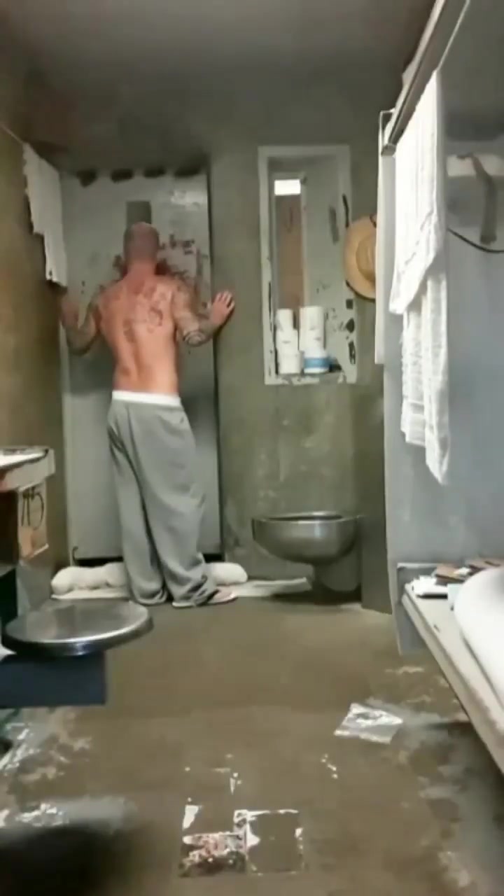 Prisoner in his cell