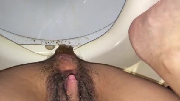 Brazilian hooker with big clit shits a huge pile of poo