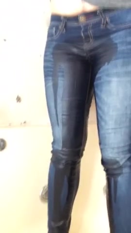 Amateur girl in pee jeans