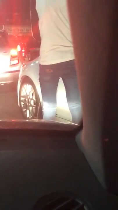Man pissing at McDonald's drivethru