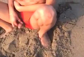 shemale Brenda peeing on beach