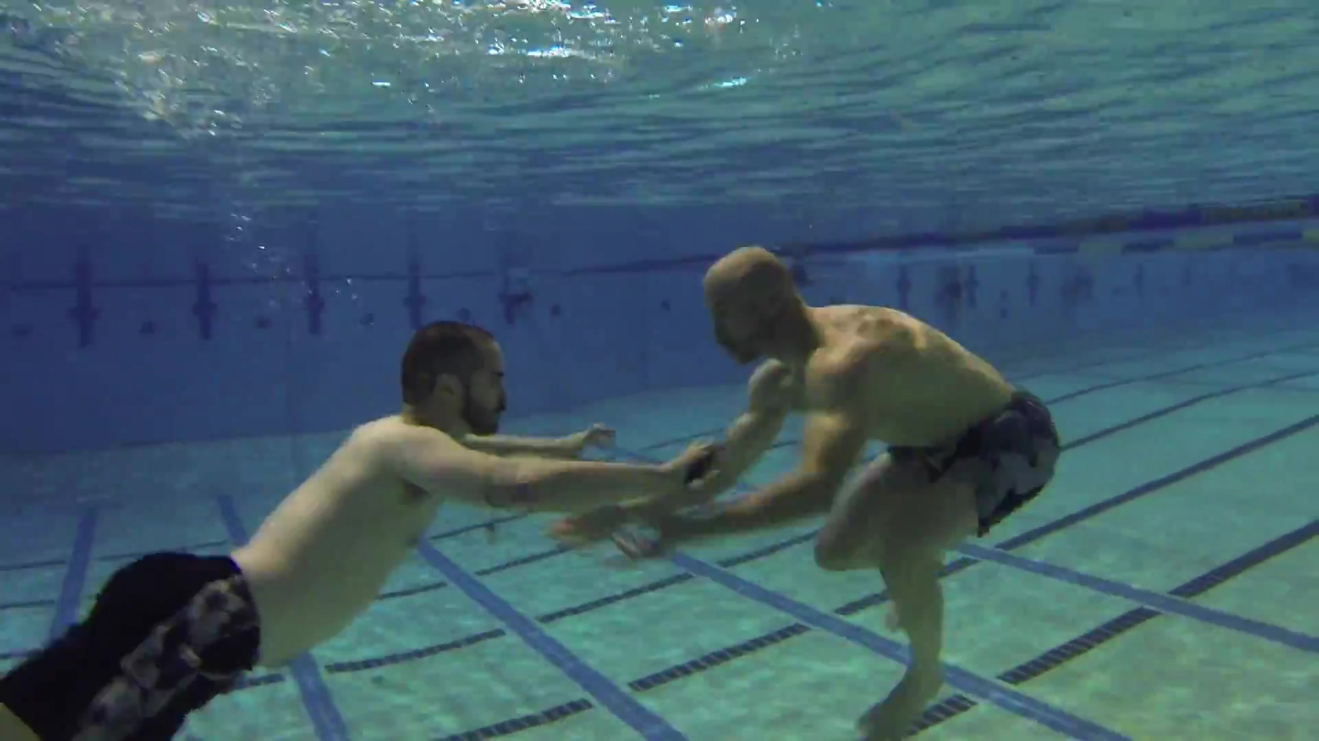 Underwater barefaced fighting buddies