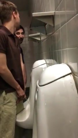Friends at urinal
