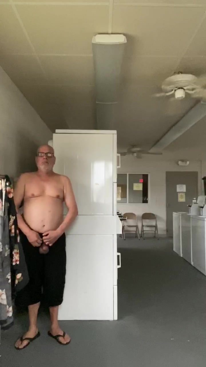Naked at laundromat