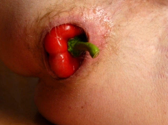 Red pepper up his asshole squeezes out