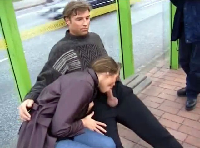Shameless blowjob on a bench of bus stop