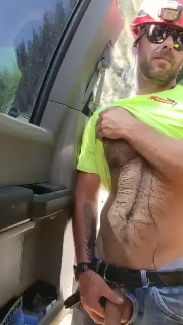 Hot construction worker pissing outdoor