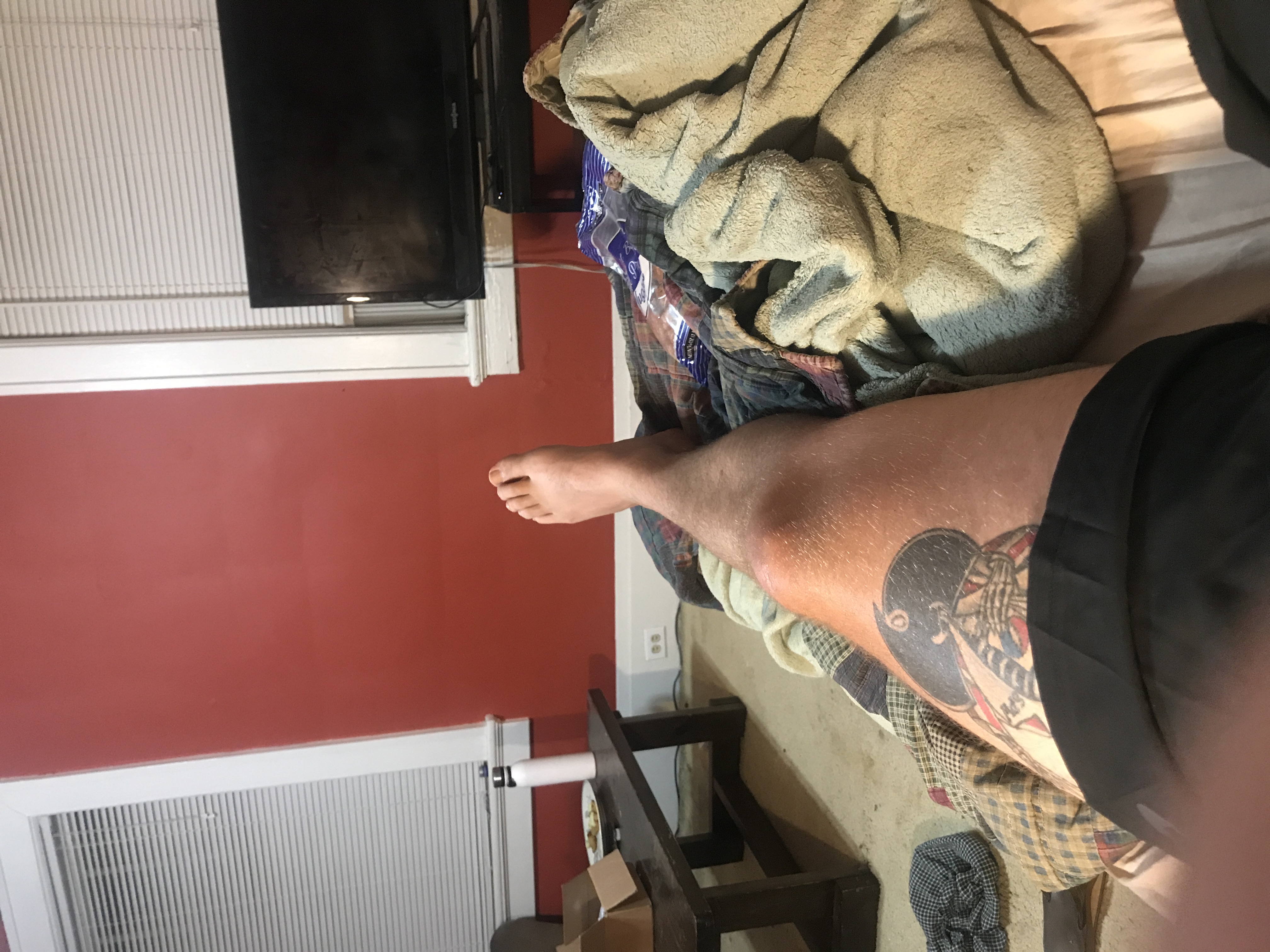 Tall guy dildos his ass while talking shit.