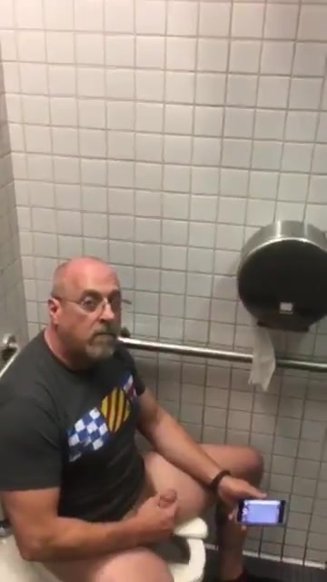Daddy wanking in public toilet is caught