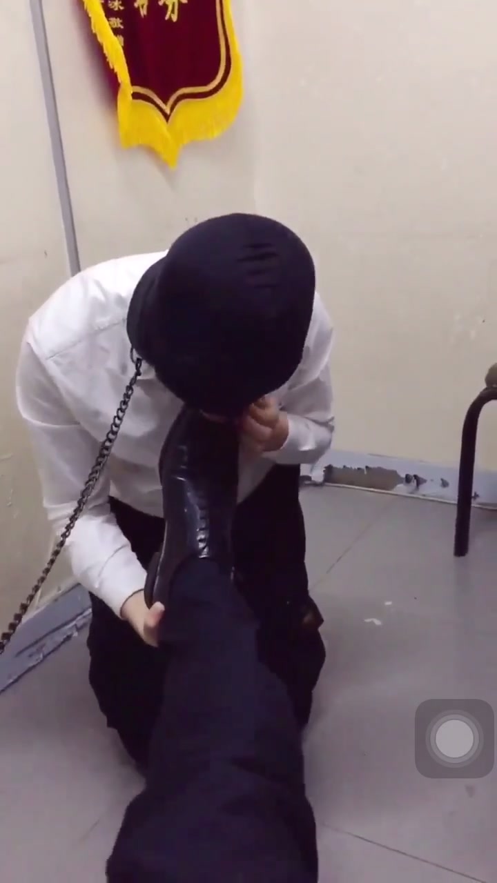 Slave dog licking shoes boss - video 2