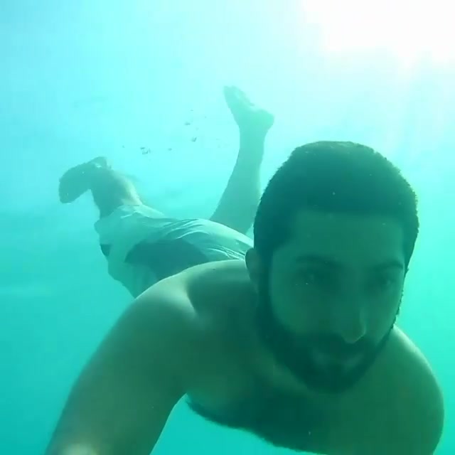 Bearded cutie barefaced underwater in sea