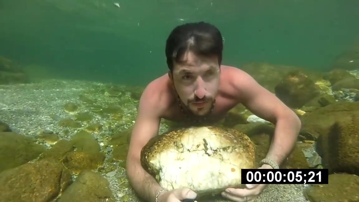 French cutie breatholding barefaced underwater in river
