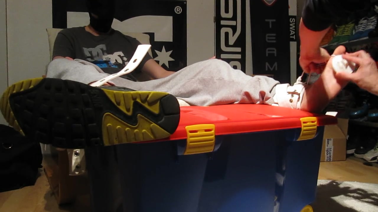 tickled male feet