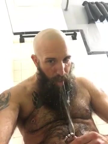 Wetting beard with piss