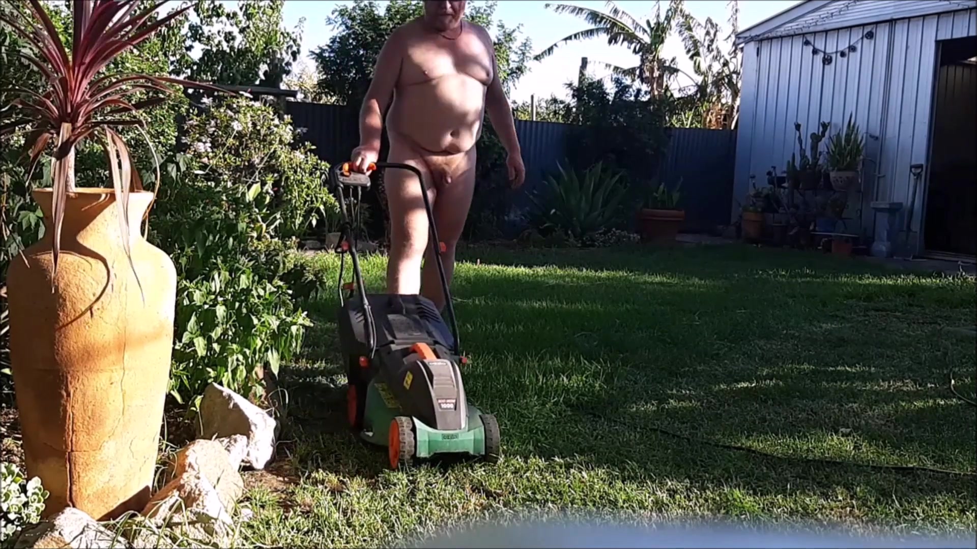 Daddy cuts the grass