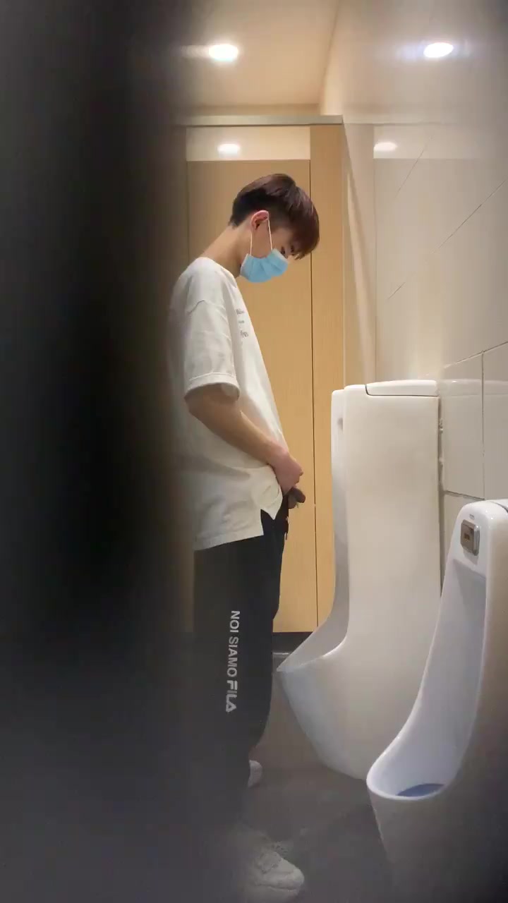 PISSING BOY AT THE URINAL 1