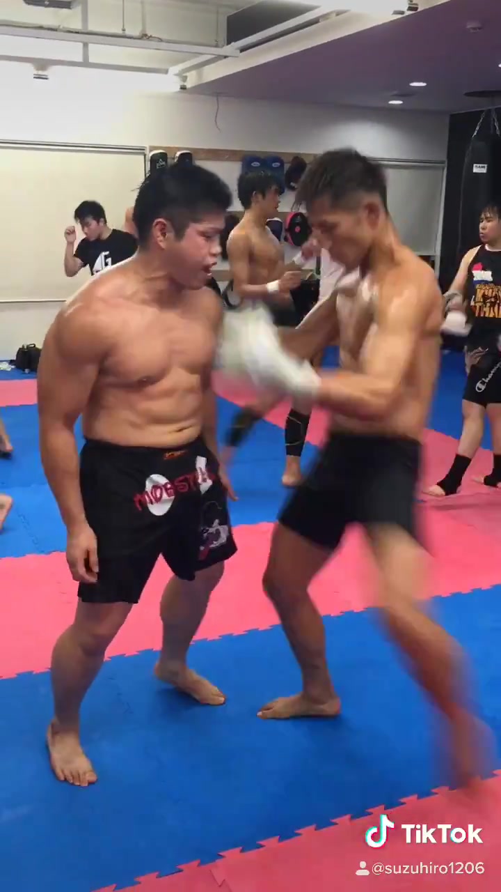 Gut punch Japanese boxer