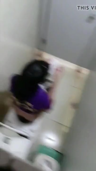 Vietnamese girl caught peeing in public wc.
