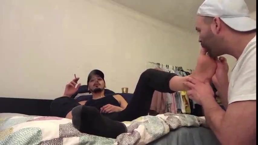 Sexy  Master get his feet licked while he smoke