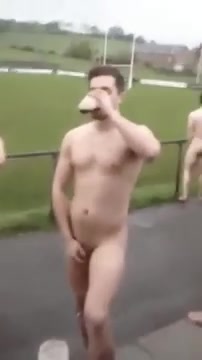 NAKED RUGBY TEAM DRINKING BEER