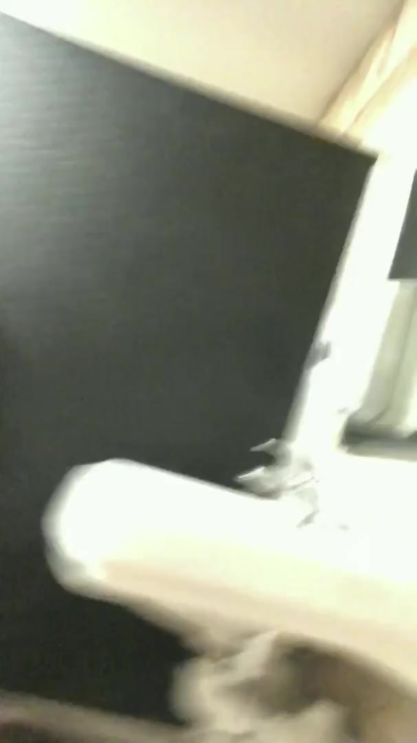 Jacking off in restroom stall