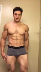 Super Handsome Bodybuilder Flexing His Muscle