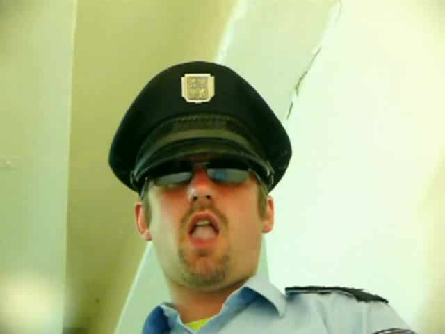 Policeman spitting on cam