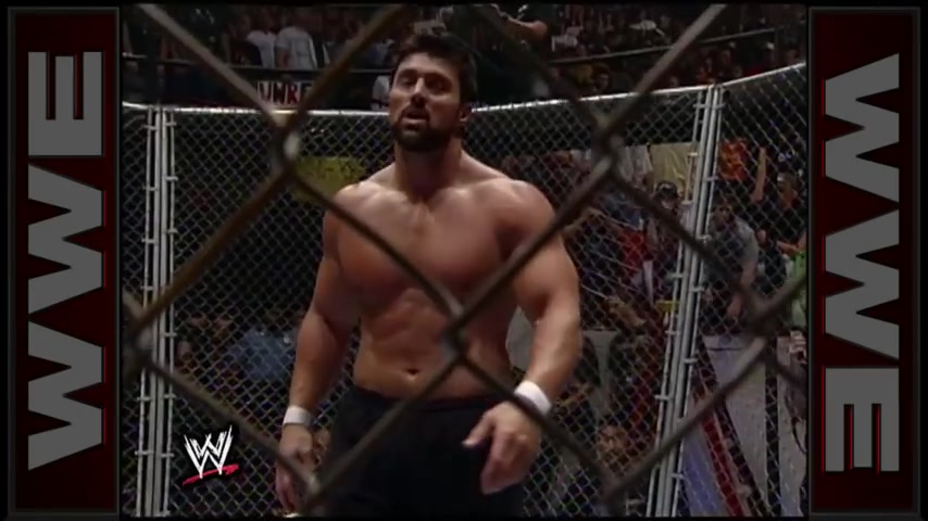 Muscular Guy Destroys Manly Hunk in a Cage Match