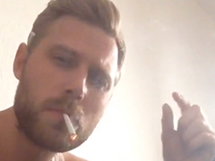 Kenny smoking a cig