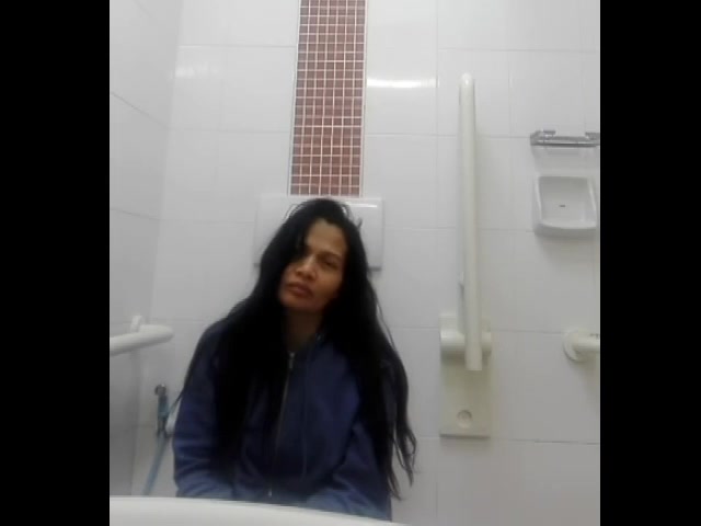 Beautiful women taking a shit in public toilet