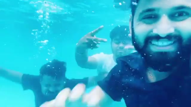 Indian buddies barefaced underwater