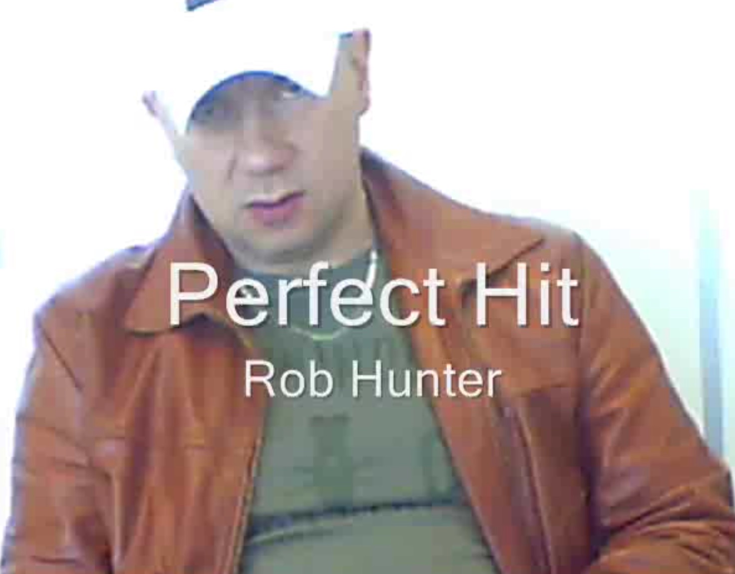 Rob Hunter Jerking off in brown leather jacket shooting his cum in his face