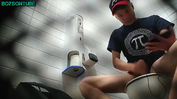 Twink in chat jerks and cums in public toilet