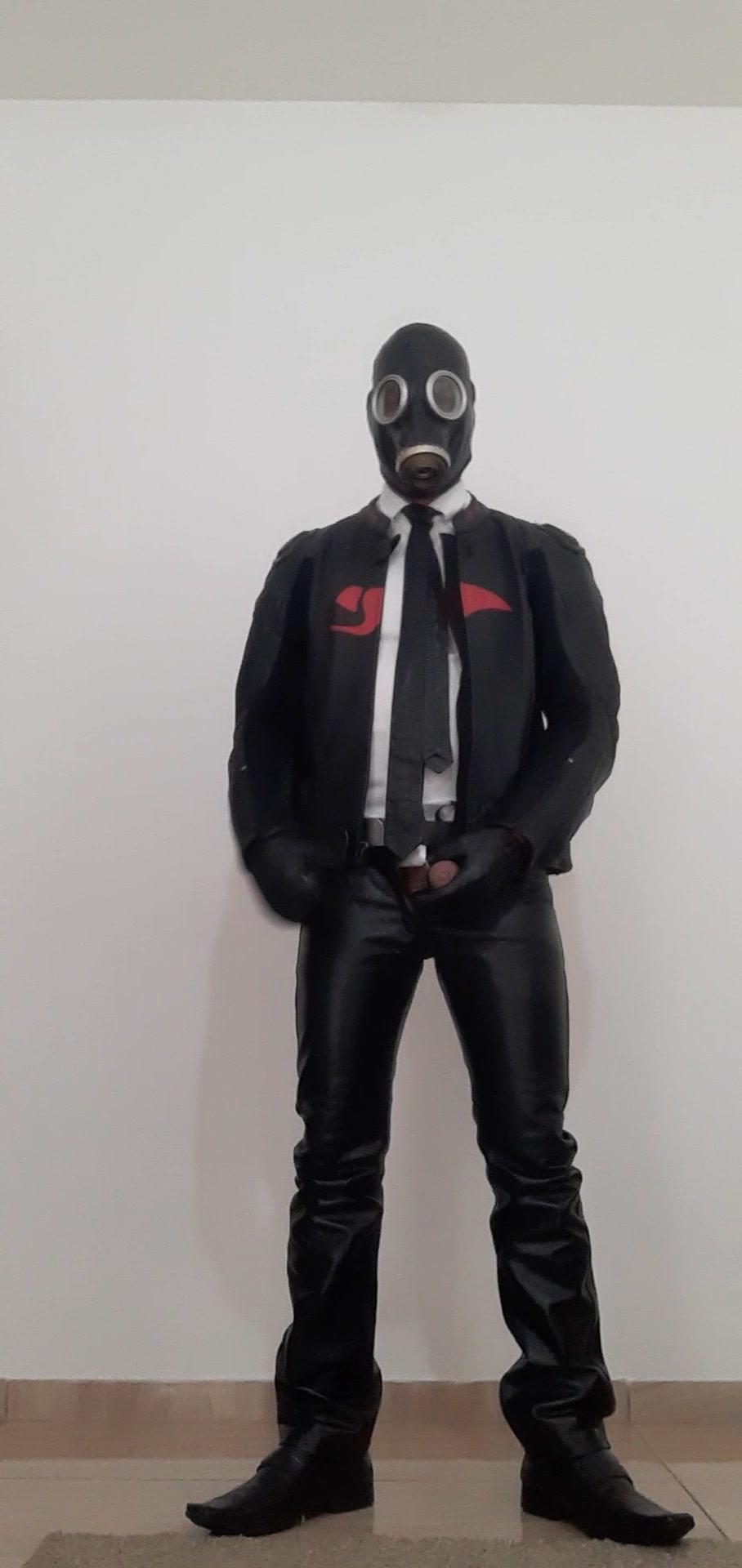 Leather pants and jacket   gloves and gasmask!