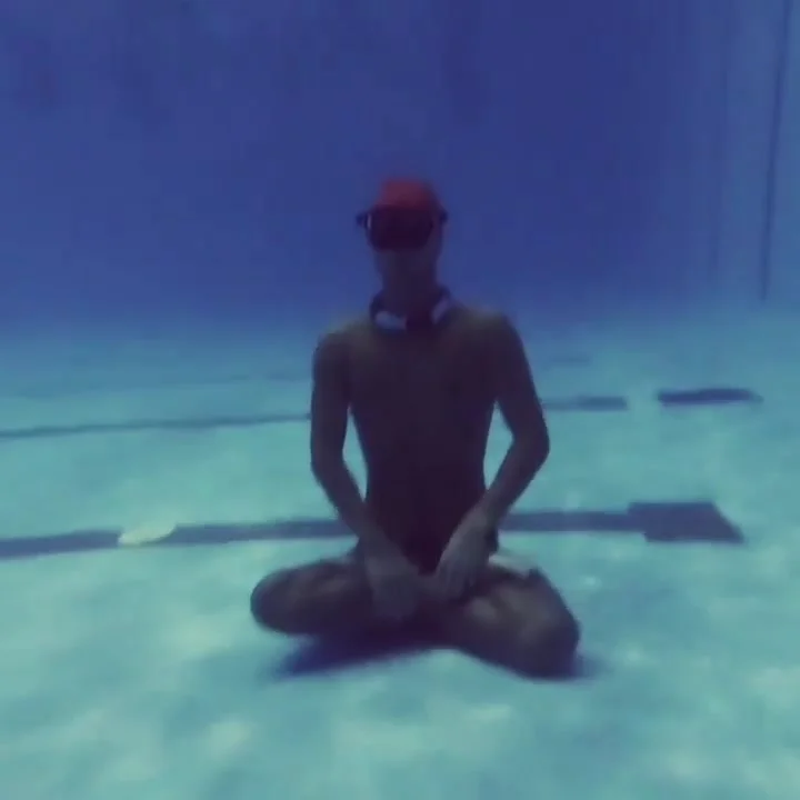 Underwater Breatholding Yoga In Speedos