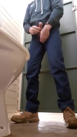Pig in workboots nuts in park restroom