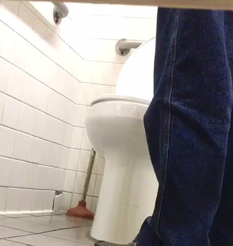 Mexican sitting on toilet