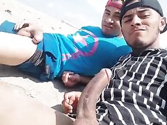 Horny Latin brothers at the beach