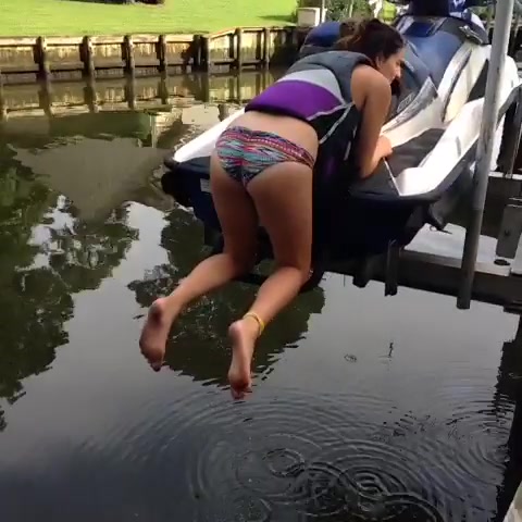 peeing into the water
