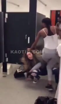 Two girls fight at the bathroom... One ends up pissed (literally)