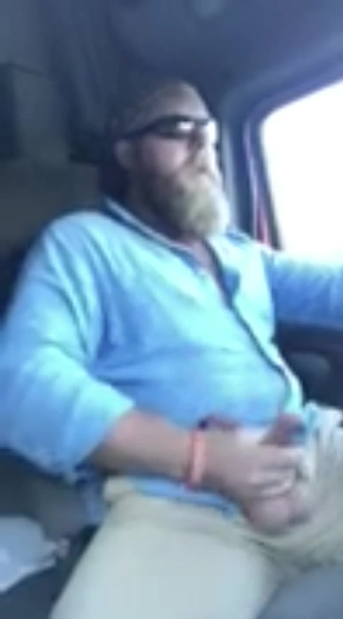 Bearded trucker jacking off and cumming in truck. 