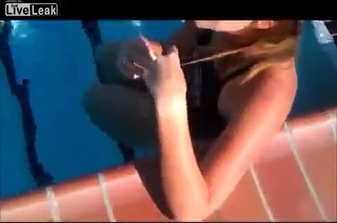 girl pees in the pool