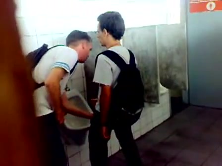 Guys caught in the public toilet