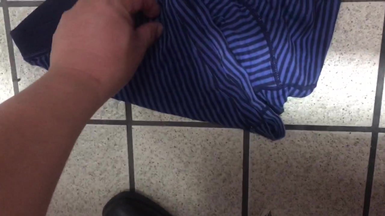 Pants dropped in a public toilet 2