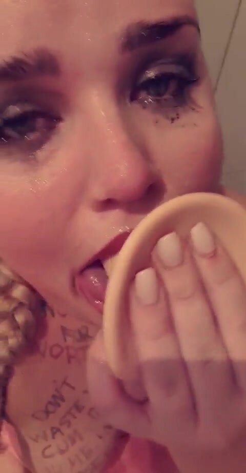 Disgusting pigslut fucks her throat with a dildo