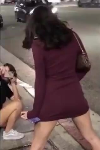 Girls pissing in public - video 2