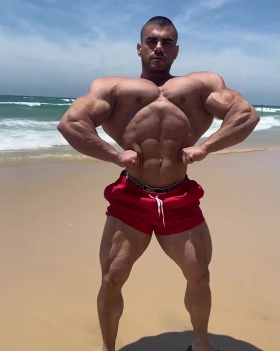 Sexy huge Sahar Kazes flexes his huge Muscles3
