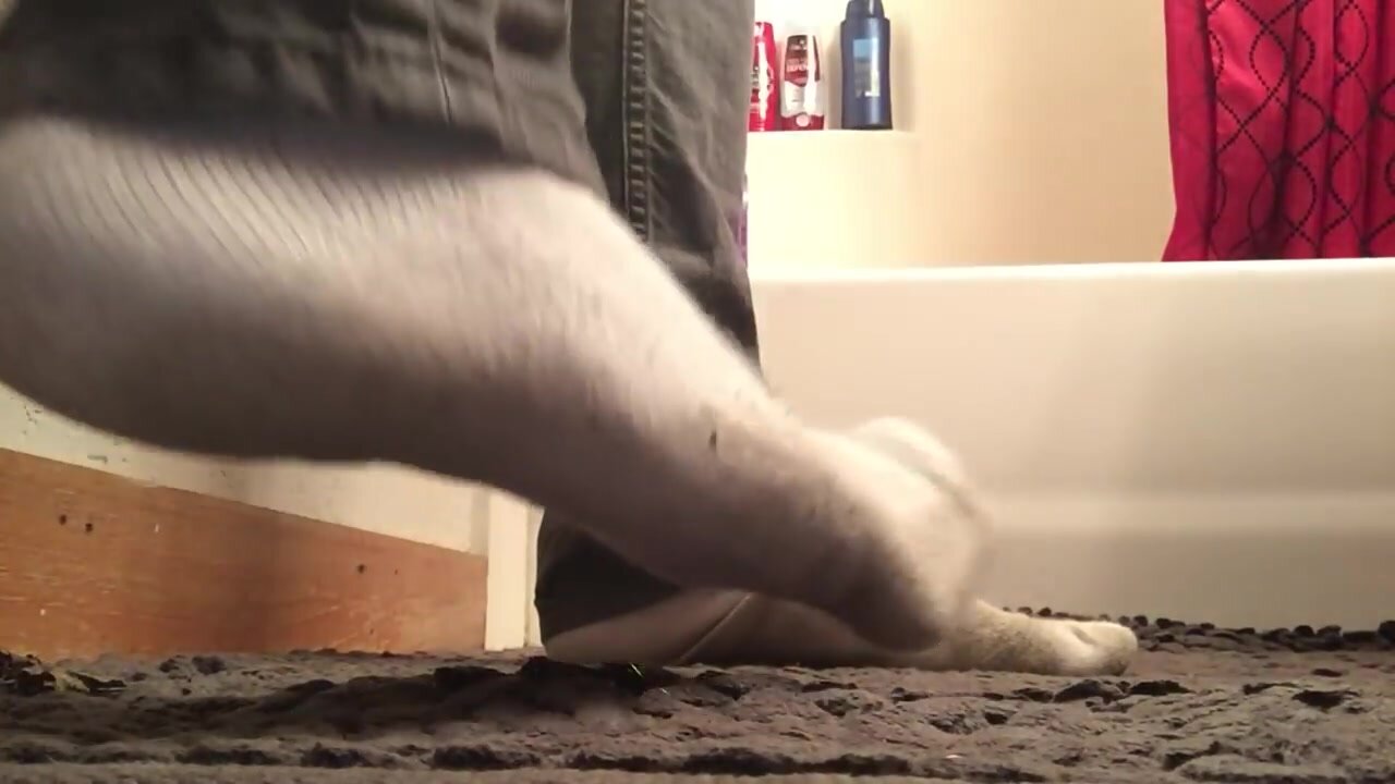 jock shows off his smelly socks and hairy barefeet